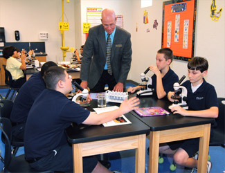 Teacher and Students at science class