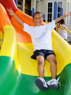Student going down a slide